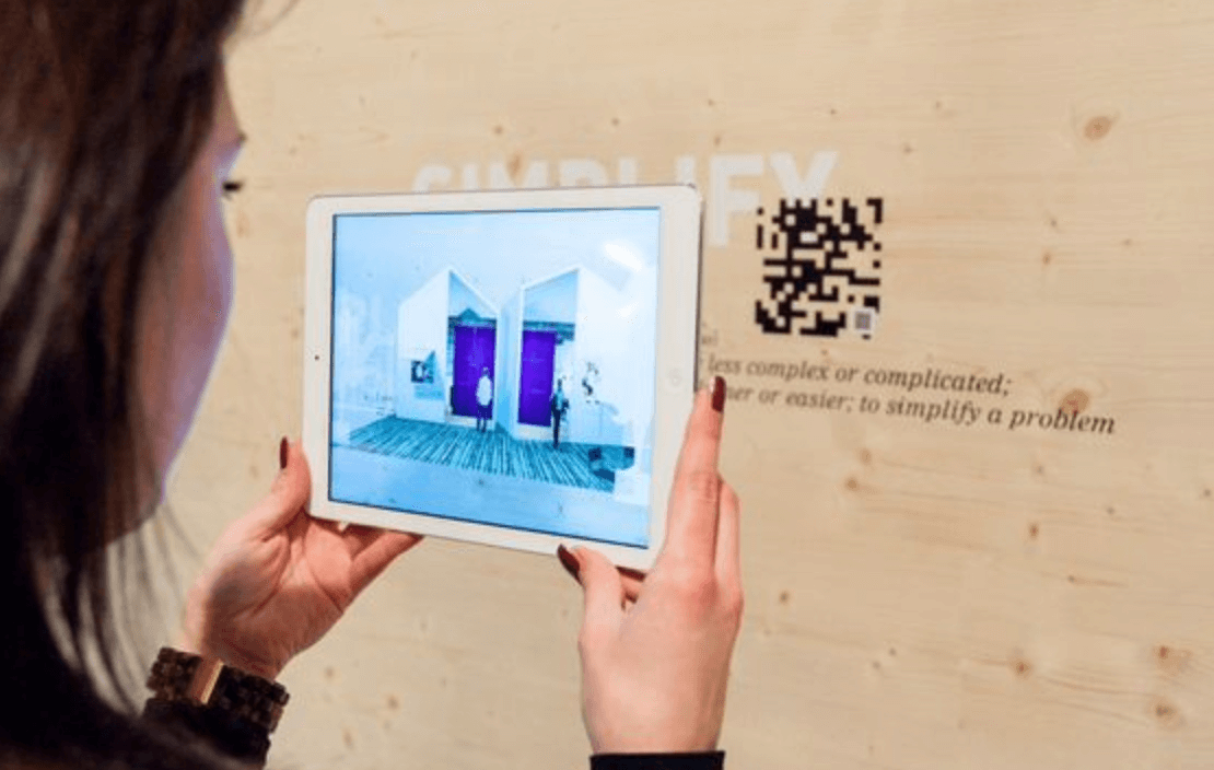 woman uses WEB AR with tablet